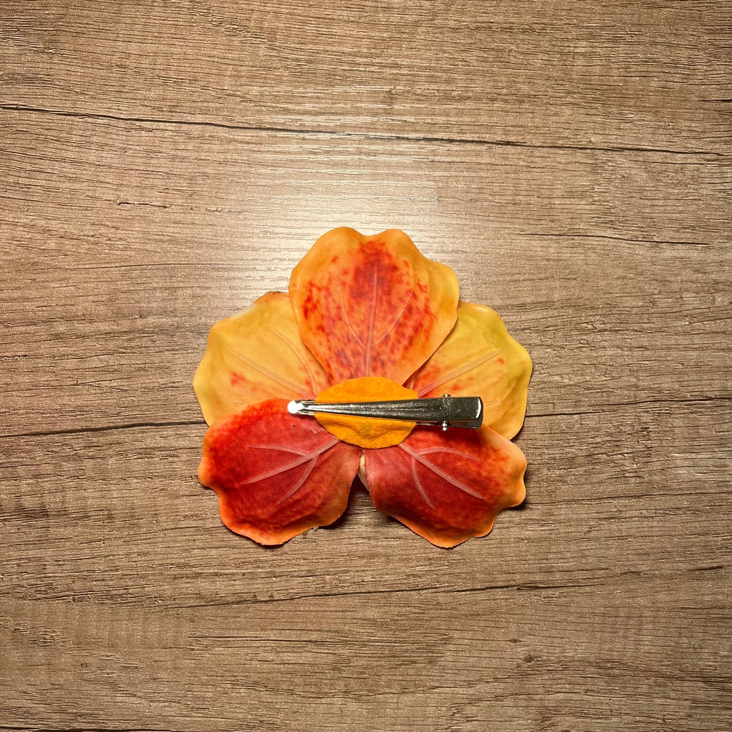 Orange orchid hair clip